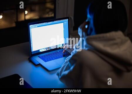 A female work at night home alone. Close-up Stock Photo