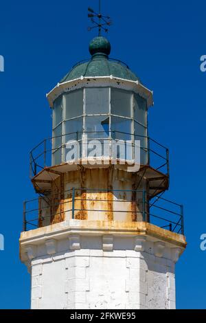 time passing over an abandoned lighthouse island of Mykonos Greece, on a summer day Stock Photo