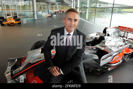 Martin Whitmarsh Team Principal of Vodafone McLaren Mercedes sitting on the car that Lewis Hamilton won the world title. 15/6/2011. PICTURE DAVID ASHDOWN Stock Photo