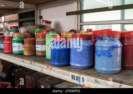 the red of plastisol ink for print tee shirt in the glass bucket. colorful  of ink background Stock Photo - Alamy