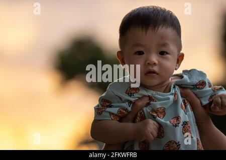 Potrait image of adorble and cute happy Asian Chinese baby boy Stock Photo