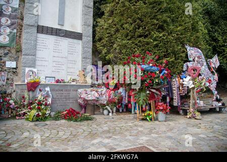 SUPERGA/TORINO ITALY, 04 MAY 2021: Flowers and many letters were left at the point where the plain first hit the ground. Commemoration day of the Grende Torino airplane disaster at Superga mountain, near Torino. 04 May 1949 a Fiat G212 of Italian Airlines Carrying the entire Torino Football Club team, due to massive fog, crashed at the back for the basilica di Superga. None of the crew members, journalists, and football team survived. Credit: Nderim Kaceli/Alamy Live News Stock Photo