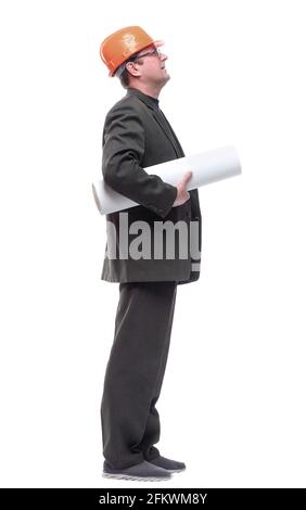side view. man with a roll of drawings looking at you. Stock Photo
