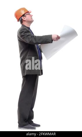 side view. man with a roll of drawings looking at you. Stock Photo