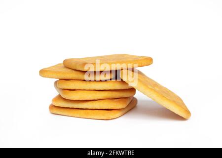 saltine cheese crackers on white isolated background top view. Stock Photo