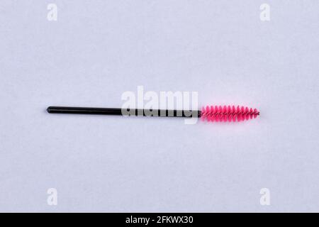 Disposable brush for eyelashes and eyebrows isolated on white background. Stock Photo