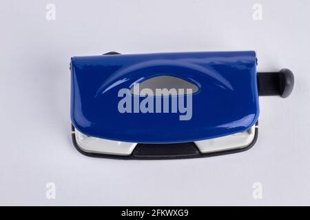 Blue office stapler isolated on white background. Stock Photo