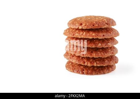 Stack of cookies with sesame grains isolated on white background Stock Photo
