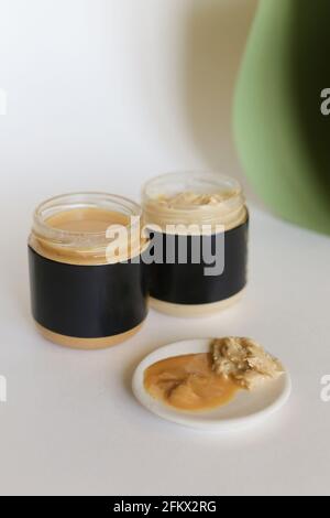 Peanut or Almond Butter in jar Stock Photo