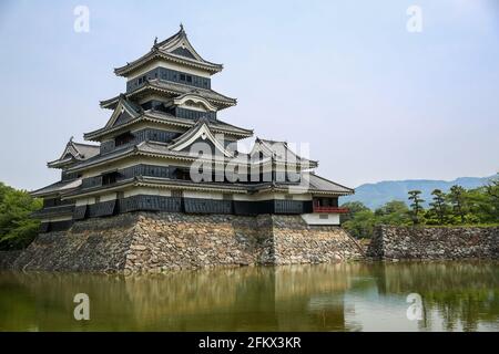 Matsumoto Castle, known as The Crow Castle surrounded by a water moat, Matsumoto, Japan. Stock Photo