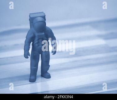 Model printed on 3d printer close-up. Cosmonaut of blue color. Stock Photo