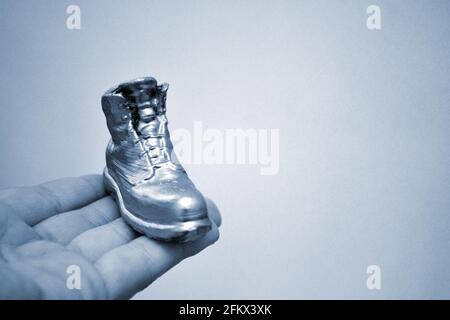 Object in the form of a boot printed on a 3d printer and covered with enamel Stock Photo