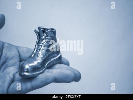 Object in the form of a boot printed on a 3d printer and covered with enamel Stock Photo