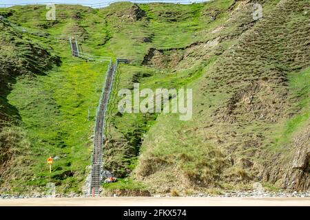The stairs down to the Silver Strand in County Donegal - Ireland. Stock Photo