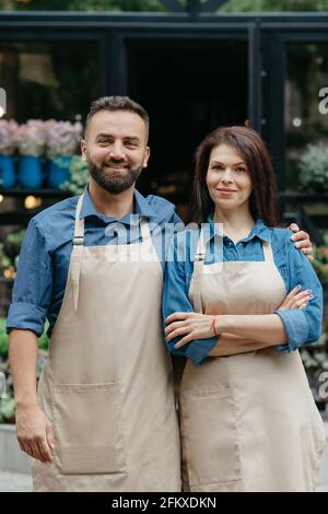 Opening eco cafe, shop or plants studio in morning. Startup and small family business Stock Photo