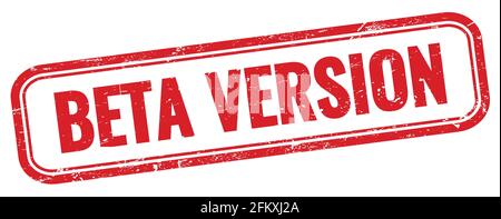 BETA VERSION text on red grungy rectangle stamp. Stock Photo