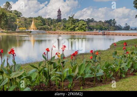 PYIN OO LWIN, MYANMAR - NOVEMBER 29, 2016: Flowers and a lake in National Kandawgyi Botanical gardens in Pyin Oo Lwin, Myanmar Stock Photo