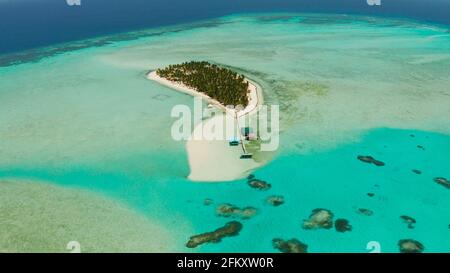 Tropical island with palm trees and a beach, top view. Onok Islan, Balabac, Philippines. Summer and travel vacation concept Stock Photo