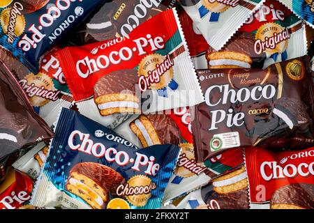 Tambov, Russian Federation - October 30, 2020 Different tastes Choco-Pie snack cakes background. Full frame. Stock Photo
