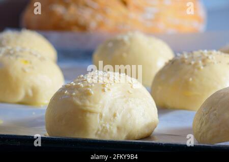 Home baking artisan brioche burger buns. Cooking bread Stock Photo - Alamy