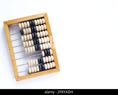 Education, training and account concept. Old wooden abacus on pure white background Stock Photo