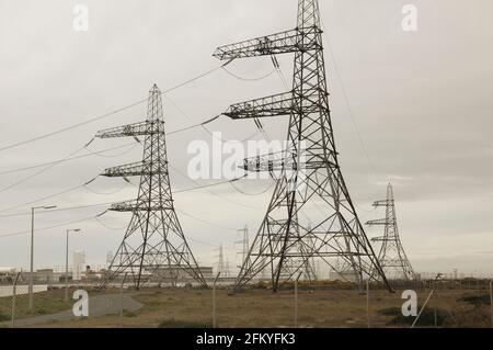 Electricity pylons at Dungeness, Kent, England, UK Stock Photo