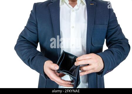 Unrecognizable man in suit showing empty wallet on white isolated background Stock Photo