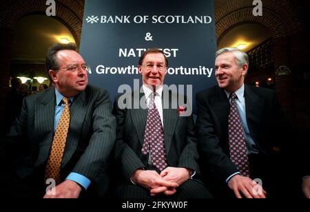 Bank Of Scotland Executives Photocall January 2000FROM LEFT TO RIGHT Gavin Masterton Group Operating Officer    Peter Burt Group Chief Executive and George Mitchell Chief Ececutive Personal Banking at media briefing in London related to their bid for Nat West Bank Stock Photo