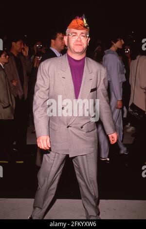 CENTURY CITY, CA - NOVEMBER 20: Elton John attends the premiere of 'Back to the Future II' on November 20, 1989 at the Cineplex Odeon Cinema in Century City, California  Credit: Ralph Dominguez/MediaPunch Stock Photo