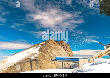 Titlis, Engelberg, Switzerland - Aug 27,2020: station of Ice-Flyer chair lift of Titlis mountain peak of Uri alps at 3040 m. Located in cantons of Stock Photo