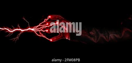 Hand shooting out a bolt of lightning - Dark and mysterious, isolated on black Stock Photo