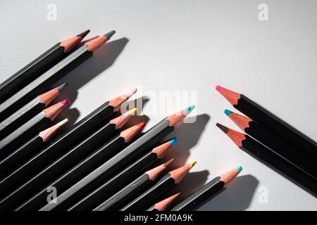 Lyon (France), May 02, 2021. Coloured pencils lined up on a white sheet. Stock Photo