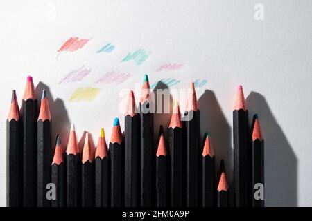 Lyon (France), May 02, 2021. Coloured pencils lined up on a white sheet. Stock Photo