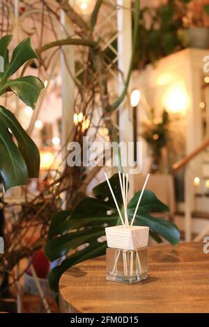 Aromatherapy reed diffuser air freshener on relaxed spa background Stock Photo