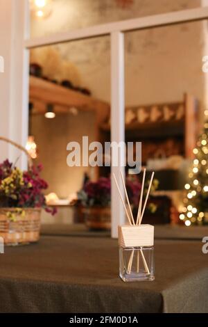 Aromatherapy reed diffuser air freshener on relaxed spa background Stock Photo