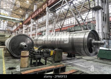 Cylindrical tubular steel products in metal working workshop factory. Stock Photo