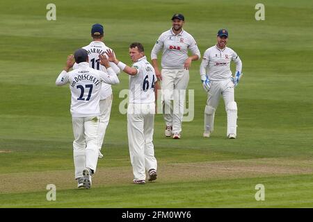 Peter Siddle of Essex celebrates with his team mates after taking the wicket of Marcus Trescothick during Somerset CCC vs Essex CCC, Specsavers County Stock Photo