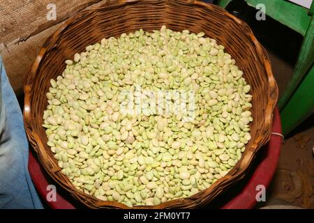 Bamboo basket full of beans shot at Boriborivalsa Village, Araku, Andhra Pradesh, India Stock Photo