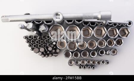 Repair kit for car repair on a white background. A set of wrenches and bit adapters of different sizes. Stock Photo