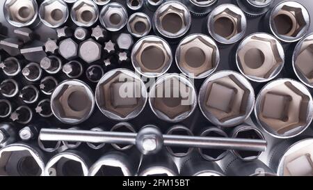 Set of wrench sockets of different sizes. Close-up top view. Stock Photo