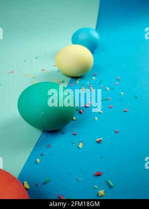 Colored chicken eggs. Easter holiday. Abstraction. Place for text. Stock Photo