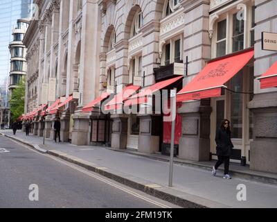 Empty and quiet luxury shopping street in London during the 