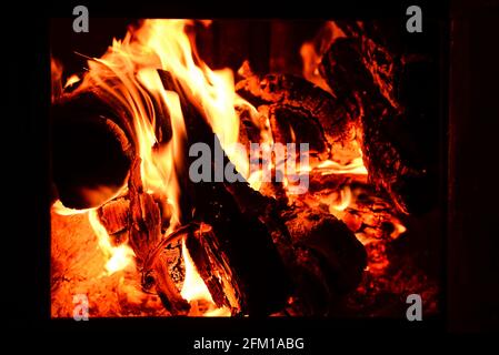 Fire line or flames with sparks isolated on black background close up. 4k  resolution. Fire is burning in the fireplace Stock Photo - Alamy