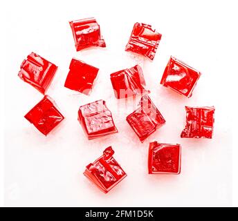 Red Jelly cubes on a white background Stock Photo