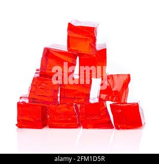 Red Jelly cubes on a white background Stock Photo