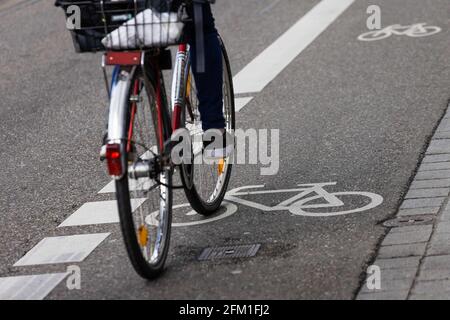 Freiburg, Germany. 05th May, 2021. A cyclist rides in a bicycle safety lane. On the occasion of the nationwide road safety campaign 'sicher.mobil.leben' (safe.mobile.life), the police are increasingly checking two-wheeled cyclists in road traffic. Credit: Philipp von Ditfurth/dpa/Alamy Live News Stock Photo