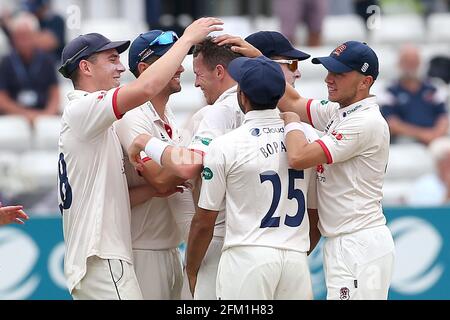 Peter Siddle of Essex celebrates with his team mates after taking the wicket of James Hildreth during Essex CCC vs Somerset CCC, Specsavers County Cha Stock Photo