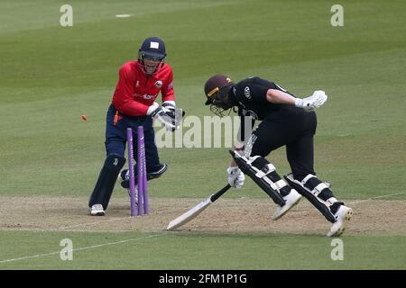 Essex wicket keeper Robbie White completes the run out of Surrey batsman Mark Stoneman during Surrey vs Essex Eagles, Royal London One-Day Cup Cricket Stock Photo