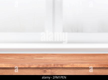 Wooden table in a kitchen. Window with empty tabletop as template. Interior with brown shelf. Stock Photo