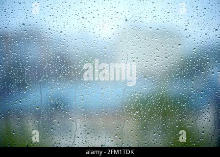 Many drops on the window, wet glass during heavy rain, as texture or background Stock Photo
